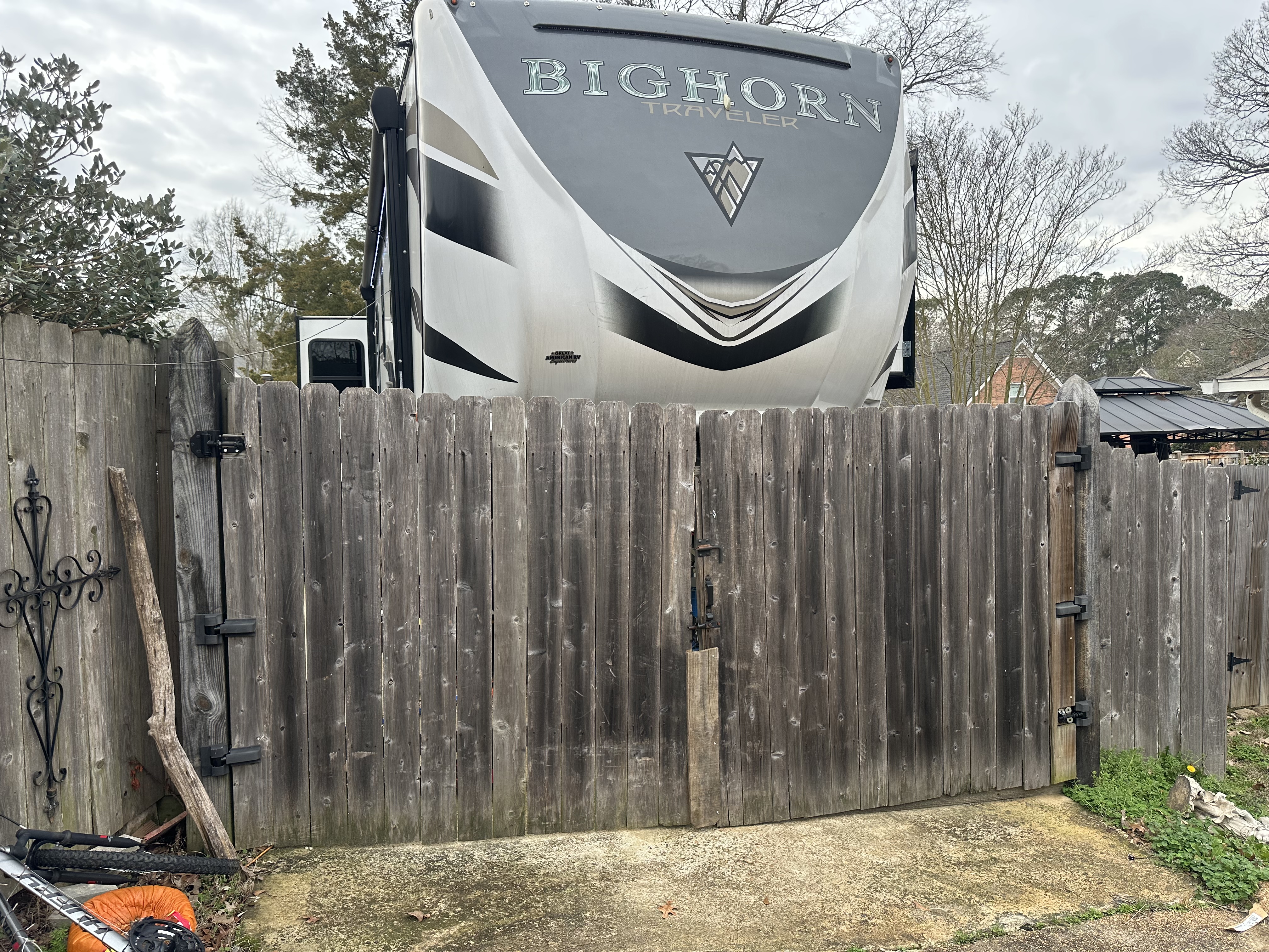 Weathered fence and gate before BP Lawn and Home repair